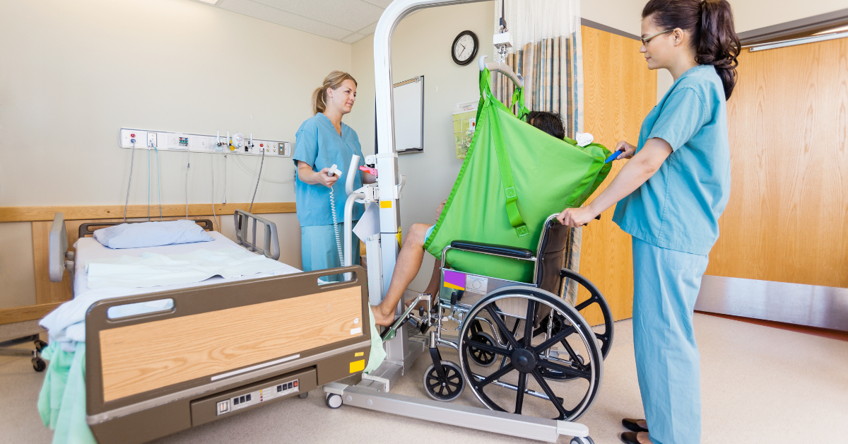 lifting patient from bed to wheelchair